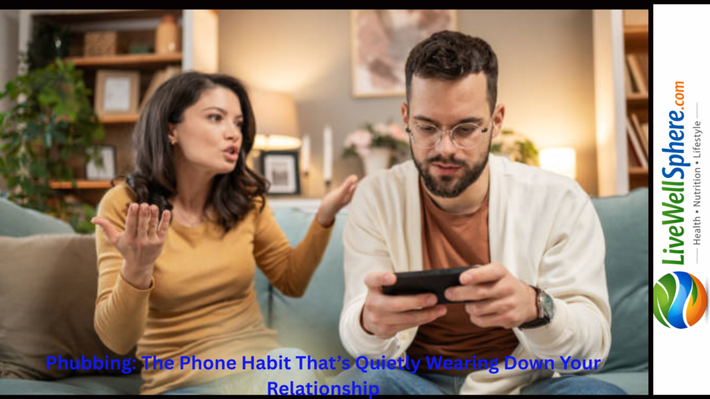 Couple sitting together while one partner is distracted by phone, illustrating phubbing in relationships
