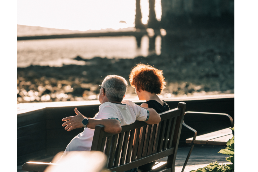 A vibrant older adult couple hiking or walking outdoors, contrasted with an image of active seniors exercising or gardening. This visually reinforces the article's core message that longevity is about maintaining health and independence, not just adding years.