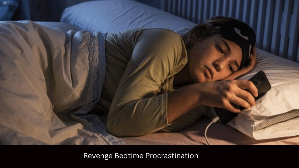 Person scrolling on phone in bed late at night — revenge bedtime procrastination