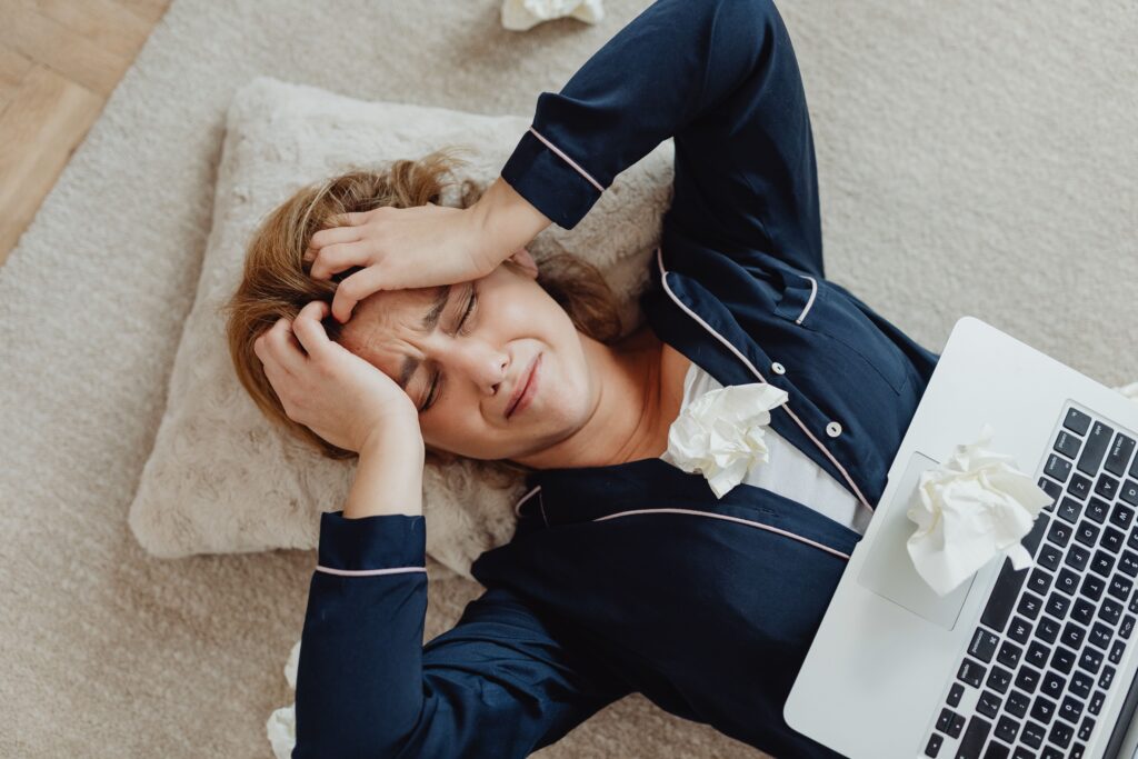 woman lying awake at night with racing thoughts, anxiety and insomnia-high-functioning anxiety concept